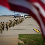 FILE PHOTO: U.S. Army paratroopers assigned to the 1st Brigade Combat Team, 82nd Airborne Division, walk toward an awaiting aircraft prior to departing for the Middle East from Fort Bragg, North Carolina, U.S. January 5, 2020.